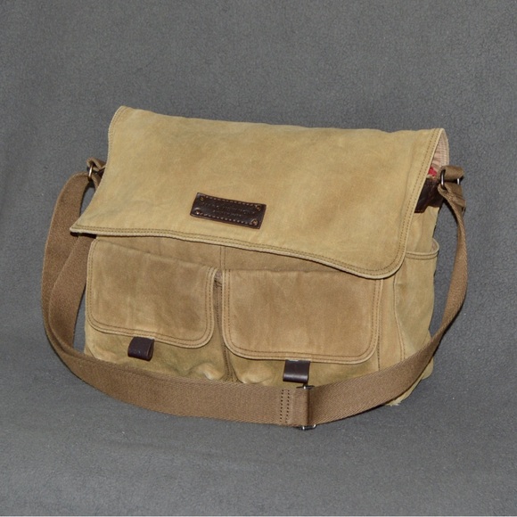 Briefcase from Andrew Marc constructed from a durable canvas with leather trim. - Picture 2 of 4